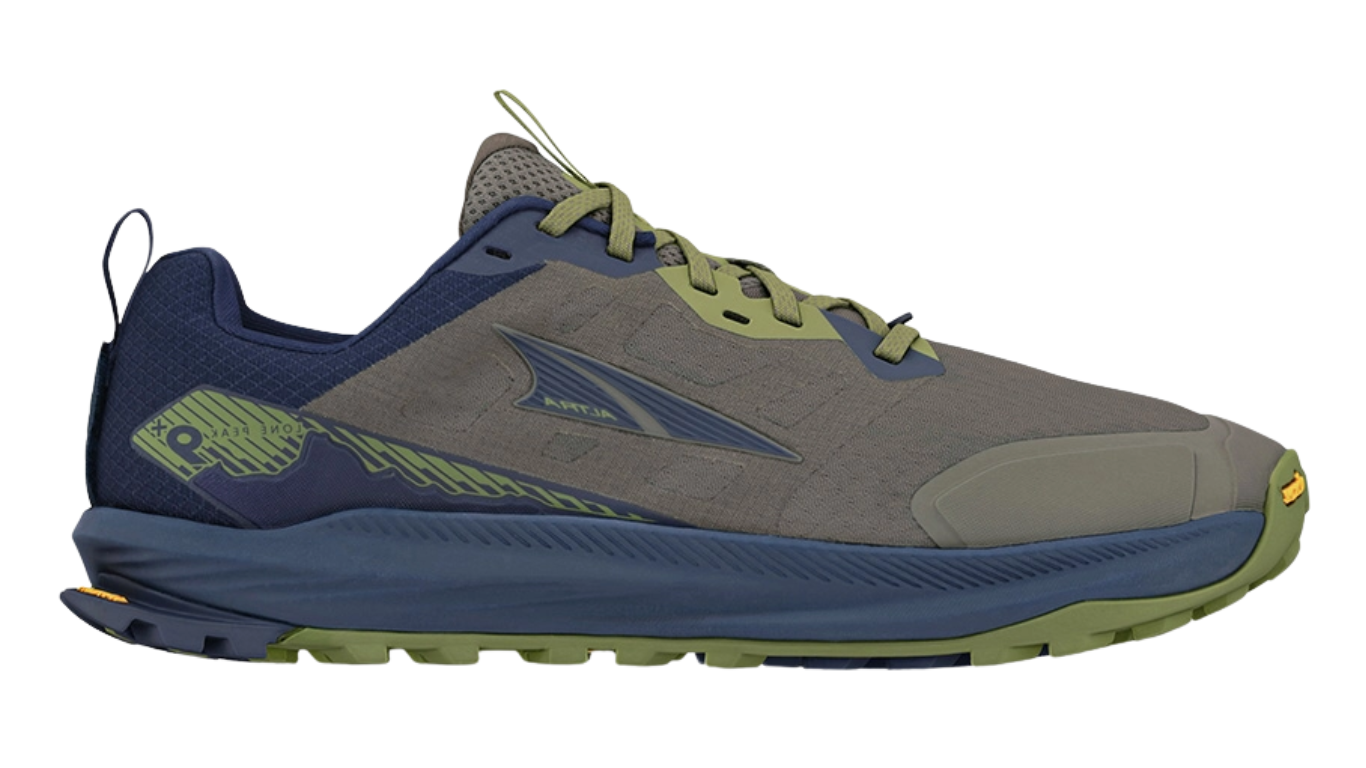 Trailrunningschuh, flache geschlossene Ausführung, Seitenansicht rechts Außenseite. Schnürung, niedrig geschnittener Schaft, stark profilierte Sohle.