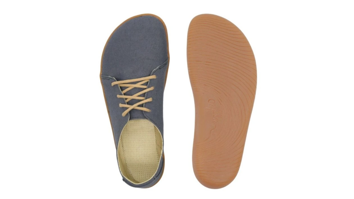 Barfußschuh, Ansicht von unten und Draufsicht. Flache Laufsohle, Innenform mit breitem Vorfuß sichtbar.