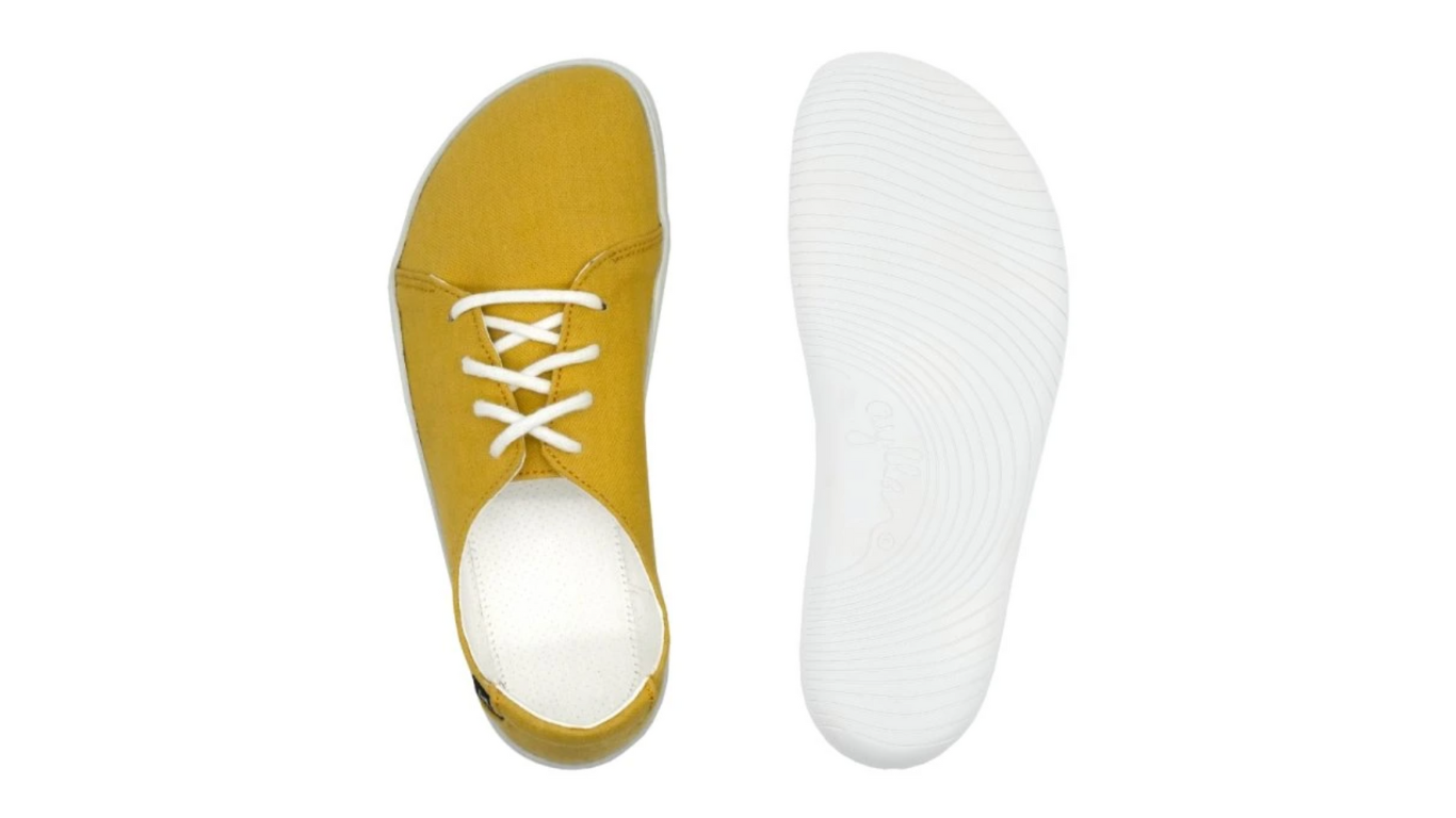 Barfußschuh, Ansicht von unten und Draufsicht. Flache Laufsohle, Innenform mit breitem Vorfuß sichtbar.