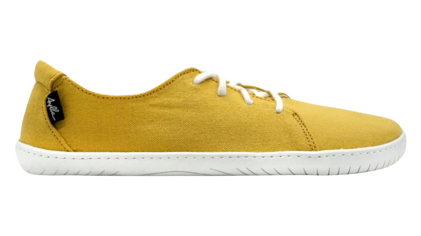 Barfußschuh, Seitenansicht außen. Geschlossener Schuh mit Schnürung, breite Zehenbox, flexible flache Sohle, geschlossener Fersenbereich.