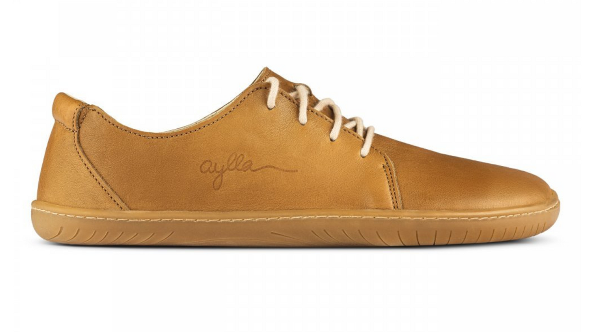 Barfußschuh, Seitenansicht außen. Geschlossener Schuh mit Schnürung, breite Zehenbox, flexible flache Sohle, geschlossener Fersenbereich.