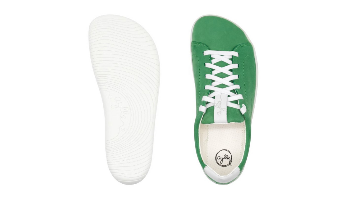 Barfußschuh für Erwachsene mit flacher, flexibler Sohle und strukturiertem Profil, Ansicht von unten und oben.