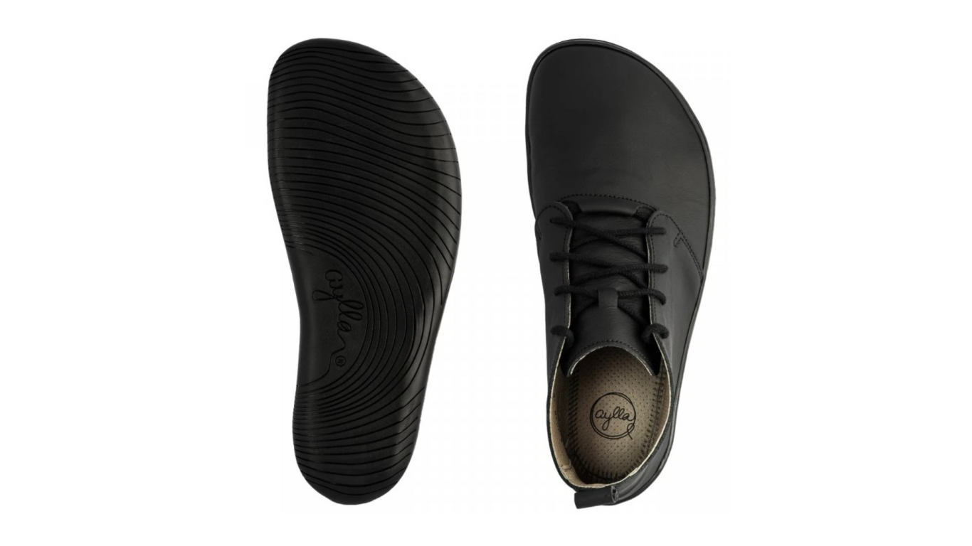 Barfußschuh für Erwachsene mit flacher, flexibler Sohle und strukturiertem Profil, Ansicht von oben und unten.