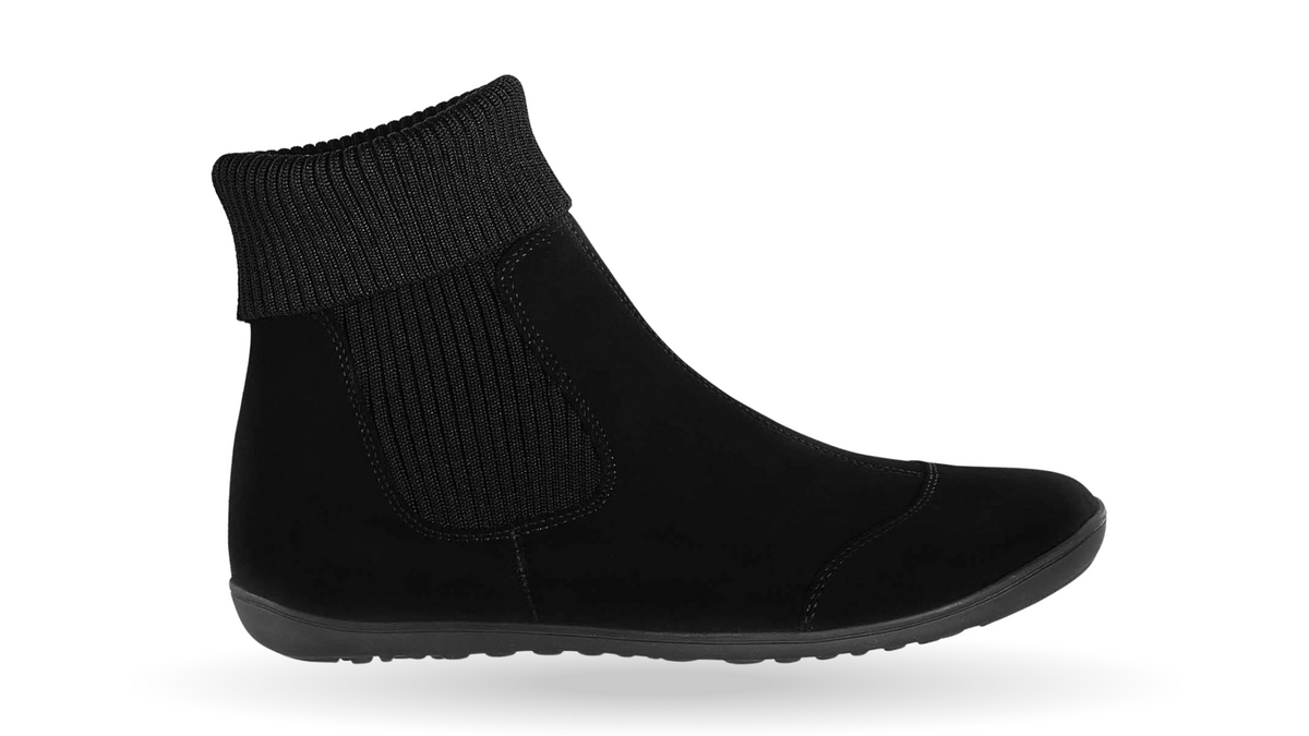 Barfußstiefelette für Erwachsene mit breiter Zehenbox, flexible Sohle, geschlossene Zehen und geschlossene Ferse, Seitenansicht außen.