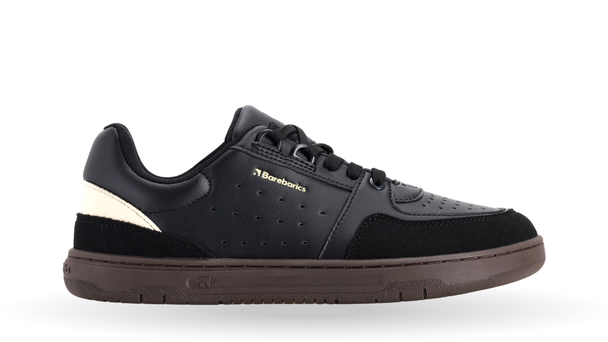 Sneaker für Erwachsene mit Schnürung, geschlossener Zehen- und Fersenpartie sowie flacher Sohle, Seitenansicht außen