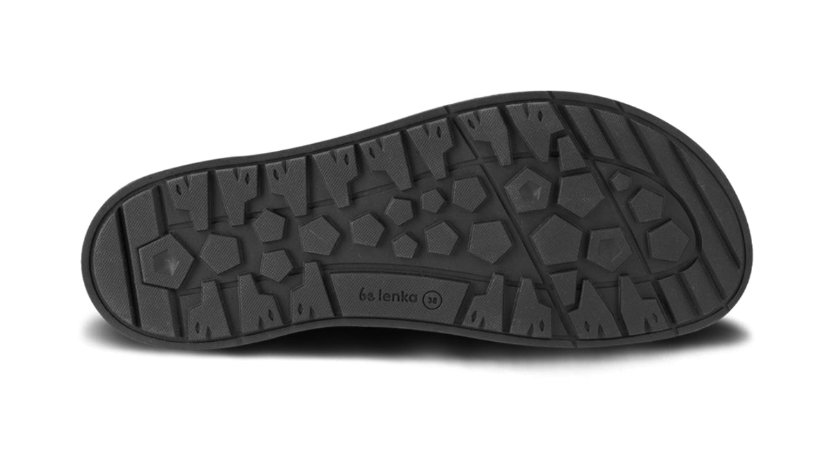 Barfußwinterschuh, Ansicht von unten. Einzelansicht der flachen Sohle mit Profilstruktur.