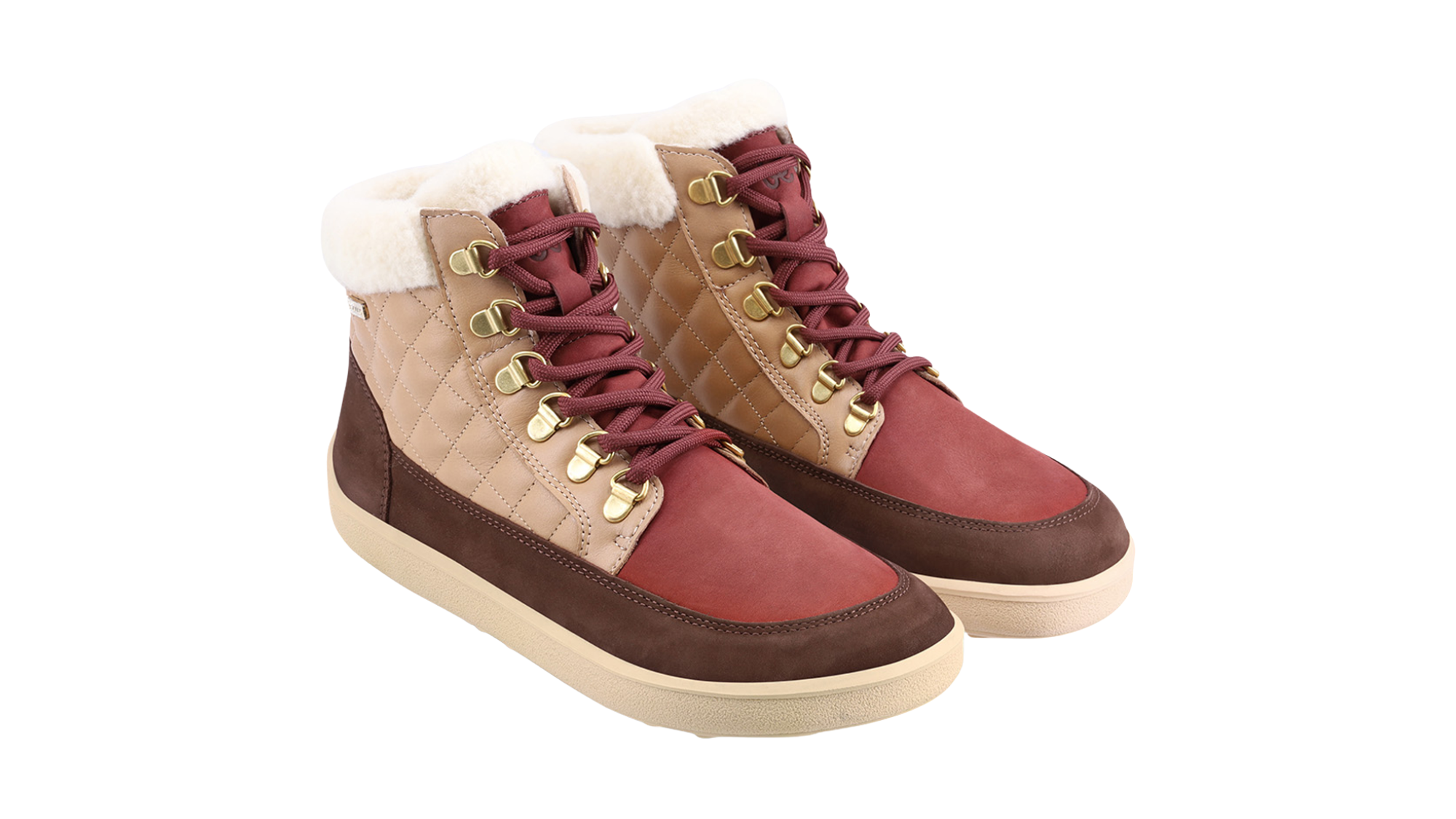 Knöchelhoher Barfußwinterschuh, Paaransicht schräg von vorne mit gepolstertem Schaft.