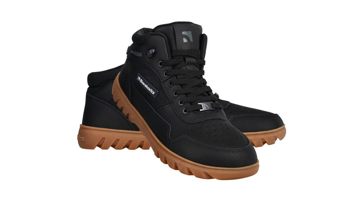 Paar Winter-Barfußschuhe für Erwachsene mit Schnürung, gepolstertem Schaft und profilierter Sohle, Seitenansicht innen und schräge Vorderansicht