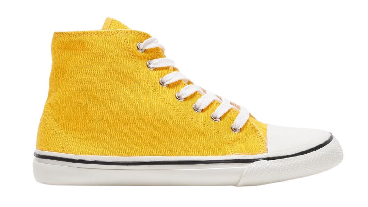 Barfußschuh für Erwachsene mit breiter Zehenbox, geschlossenem Zehenbereich, geschlossener Ferse, Schnürung, flacher flexibler Sohle, Seitenansicht außen.