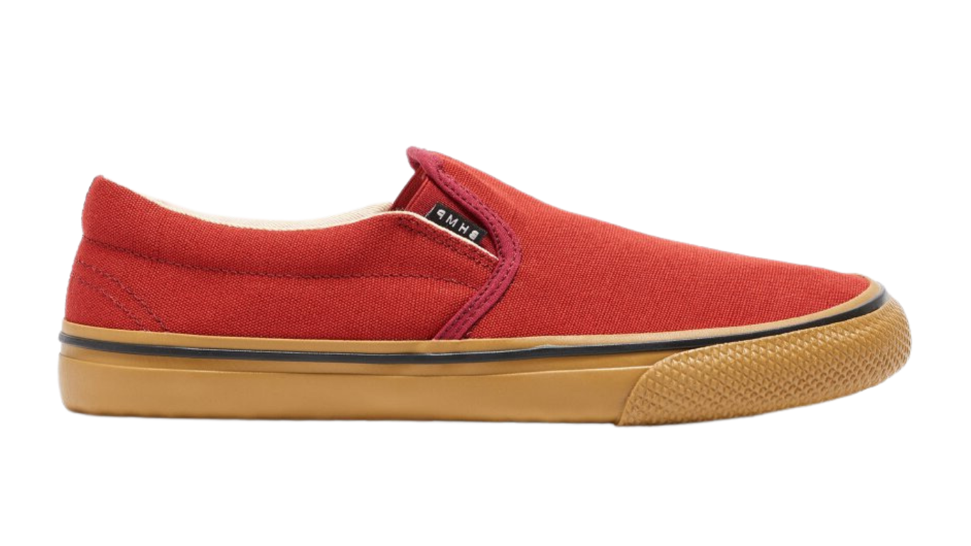Barfußschuh für Erwachsene mit breiter Zehenbox, geschlossenem Zehenbereich, geschlossener Ferse, Schlupfform ohne Verschluss, flacher flexibler Sohle, Seitenansicht außen.
