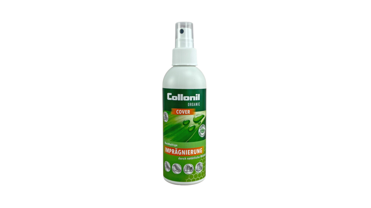 Weiße Sprühflasche mit grünem Etikett, Aufdruck „Collonil Organic Cover“, Abbildung von Wassertropfen und mehreren Materialsymbolen auf der Vorderseite, vor weißem Hintergrund.
