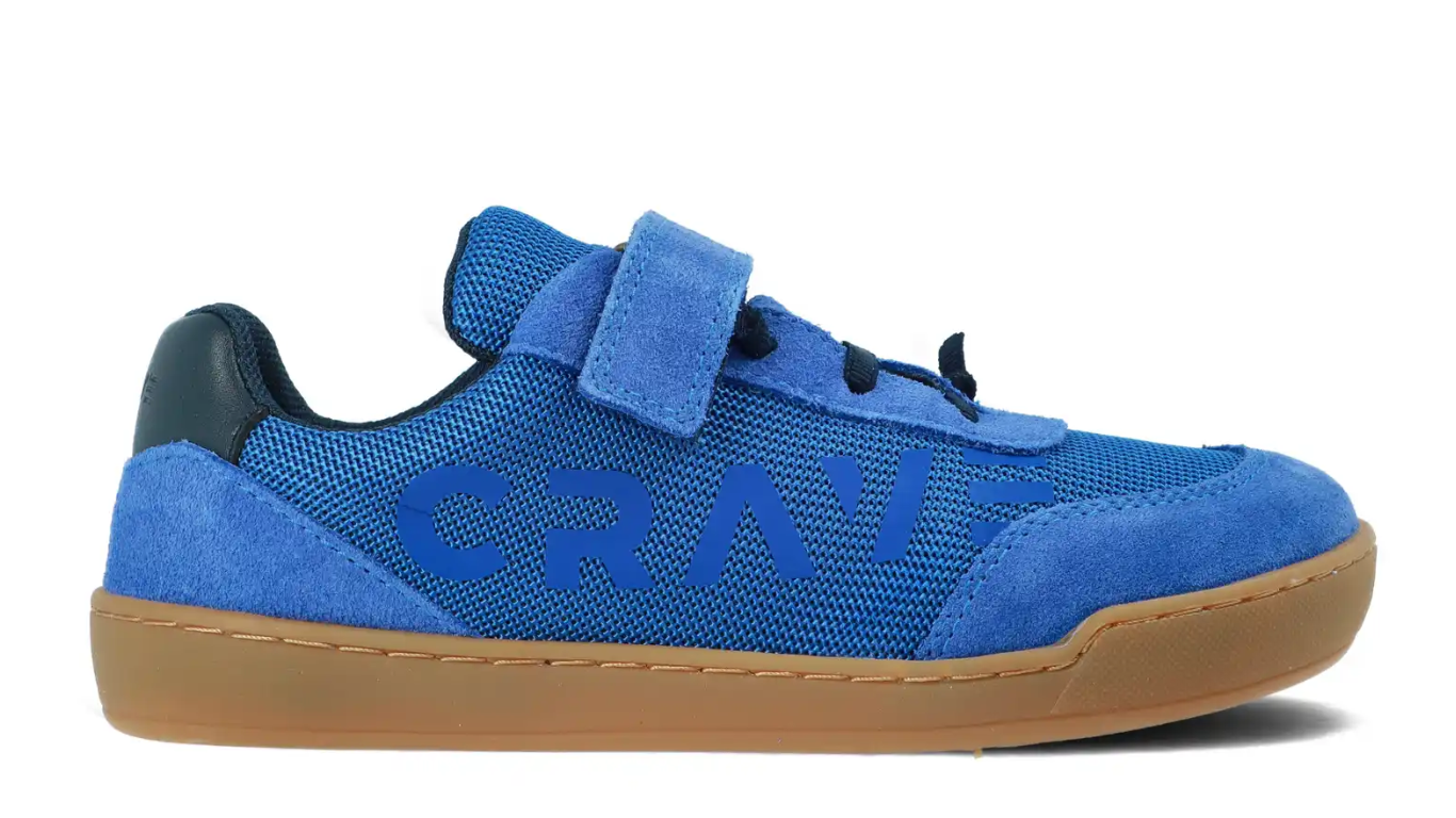 Barfußschuh für Kinder mit Klettverschluss, breiter Zehenbox, flacher flexibler Sohle, geschlossene Zehen und Ferse, Seitenansicht außen