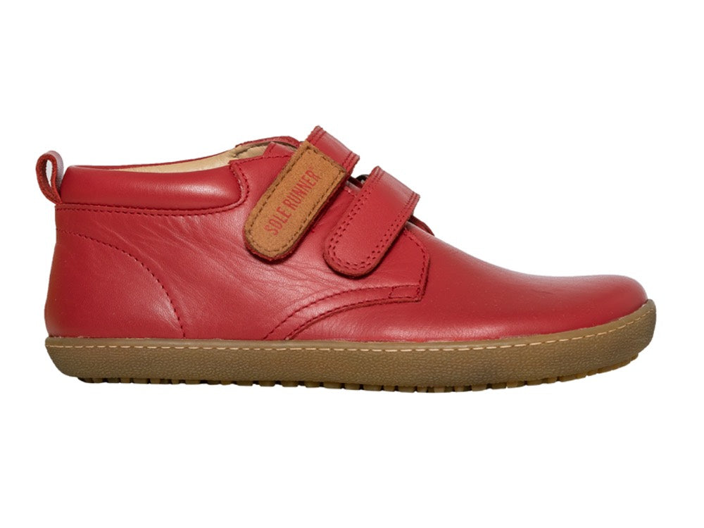 Kinder Barfußschuh, geschlossene Zehen und geschlossener Fersenbereich, zwei Klettverschlüsse, flexible Sohle, einzelner Schuh, Seitenansicht außen