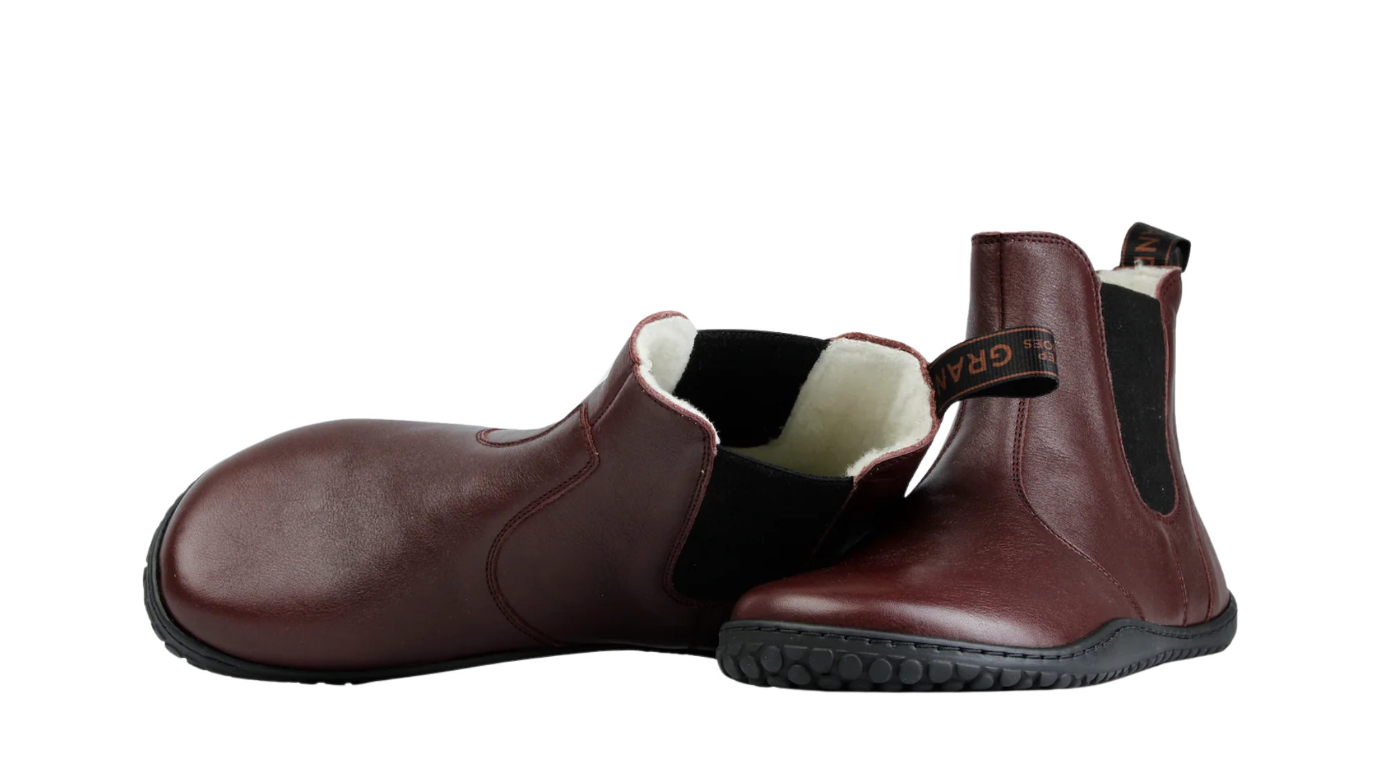 Paar Winter-Chelsea-Barfußschuhe für Erwachsene mit breiter Zehenbox und elastischen Seiteneinsätzen, Draufsicht und schräge Vorderansicht