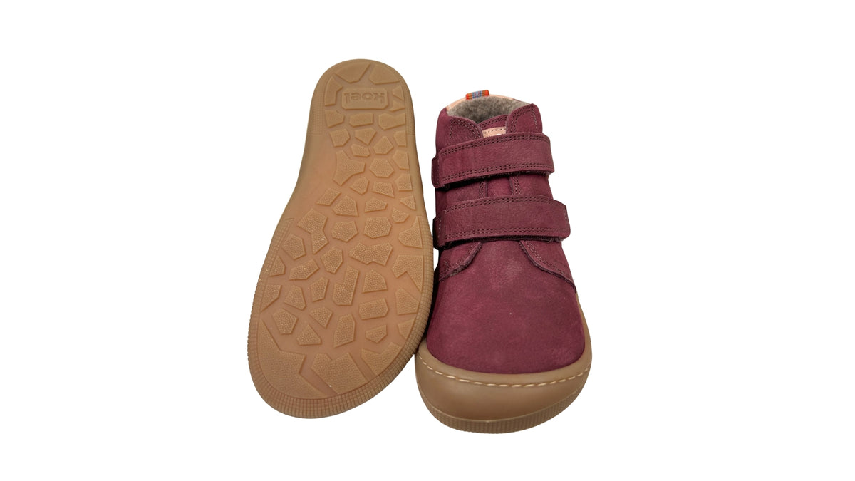 Kinder-Barfußschuh mit flacher, flexibler Sohle und strukturiertem Profil, Ansicht von unten.