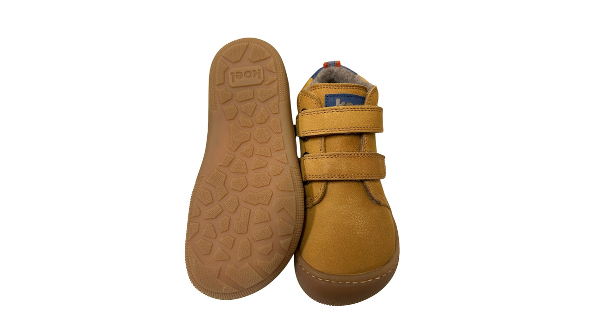 Kinder-Barfußschuh mit flacher, flexibler Sohle und strukturiertem Profil, Ansicht von unten.