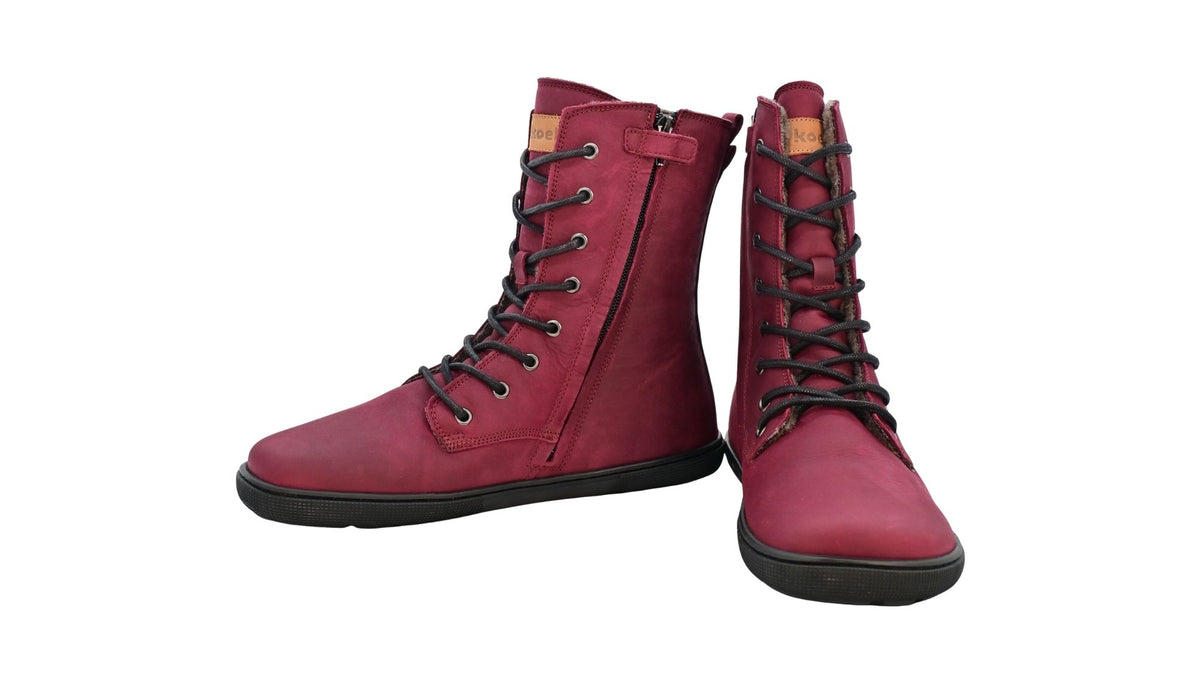 Barfußstiefel für Erwachsene mit flacher Sohle als Paar, Seitenansicht und Vorderansicht