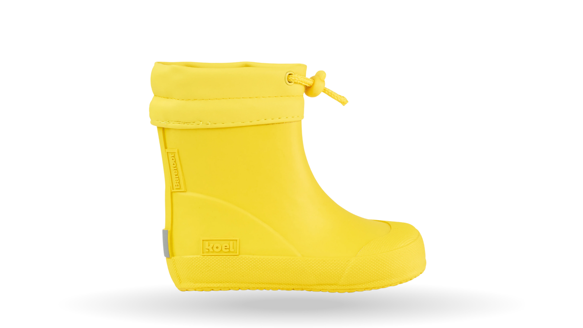 Gummistiefel für Kleinkinder mit kurzem Schaft, breiter Zehenbox und Kordelzug am Schaftrand, Seitenansicht außen