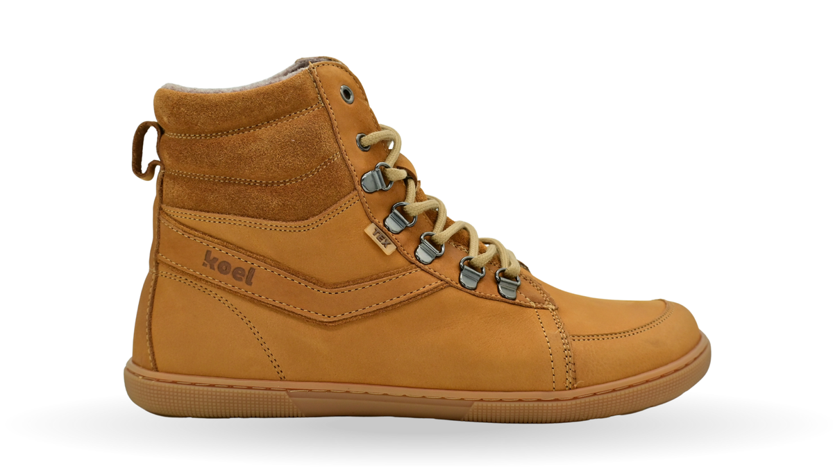Leicht gefütterter halbhoher Barfußschuh für Damen mit Schnürung, breiter Zehenbox und flacher Sohle, Seitenansicht außen