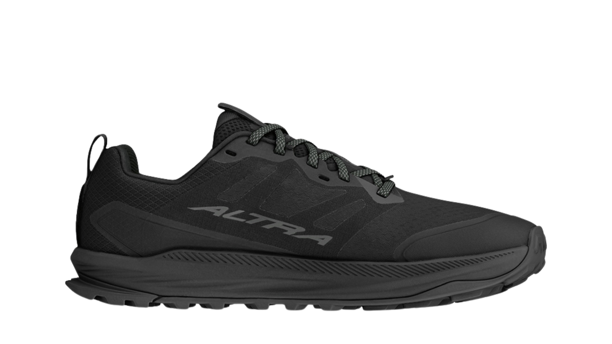 Barfußschuh für Erwachsene mit breiter Zehenbox, geschlossenem Zehenbereich, geschlossener Ferse, Schnürung, profilierte Sohle, Seitenansicht innen.
