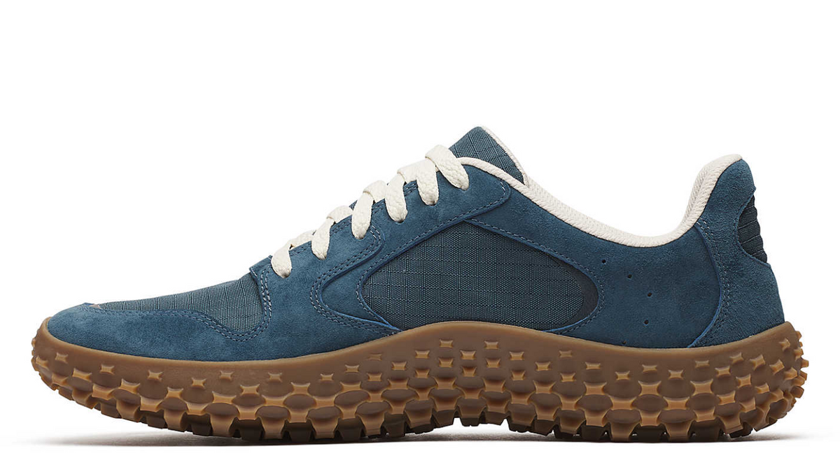 Merrell Wrapt Sneaker in Blau Dusk mit Wildleder, Netzdetails und markanter Noppenlaufsohle, Seitenansicht links