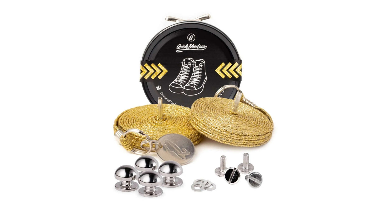 Schnürsenkel-Set, zwei runde Senkel mit Metallenden, Schraubverschlüsse, Metallknöpfe und Dose, Draufsicht