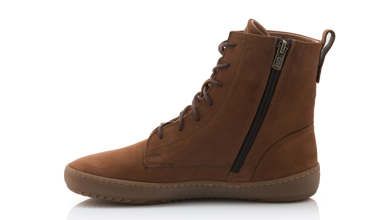 Barfußstiefel mit breiter Zehenbox, flexibler Sohle und Schnürung, geschlossene Zehen und geschlossener Fersenbereich, einzelner Schuh, Seitenansicht innen