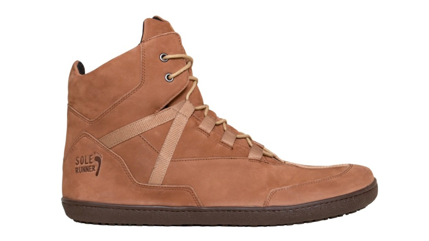 Barfußwinterstiefel, geschlossene Zehen und geschlossener Fersenbereich, Schnürsenkel mit Ösen, flexible Sohle, einzelner Schuh, Seitenansicht außen