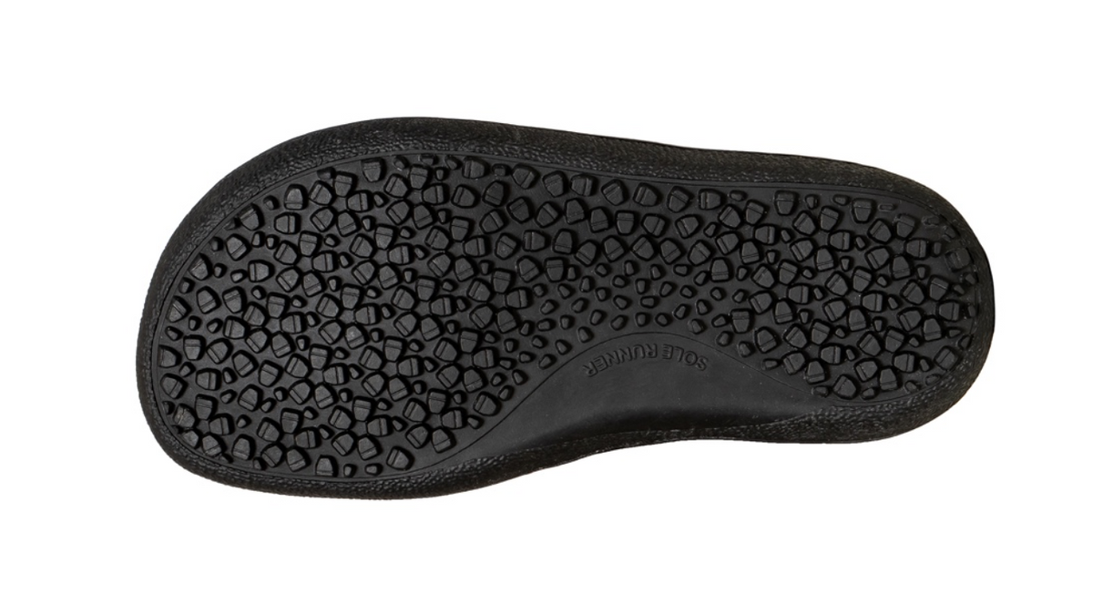 Barfußwinterstiefel für Kinder mit flacher, profilierter Sohle, Ansicht von unten