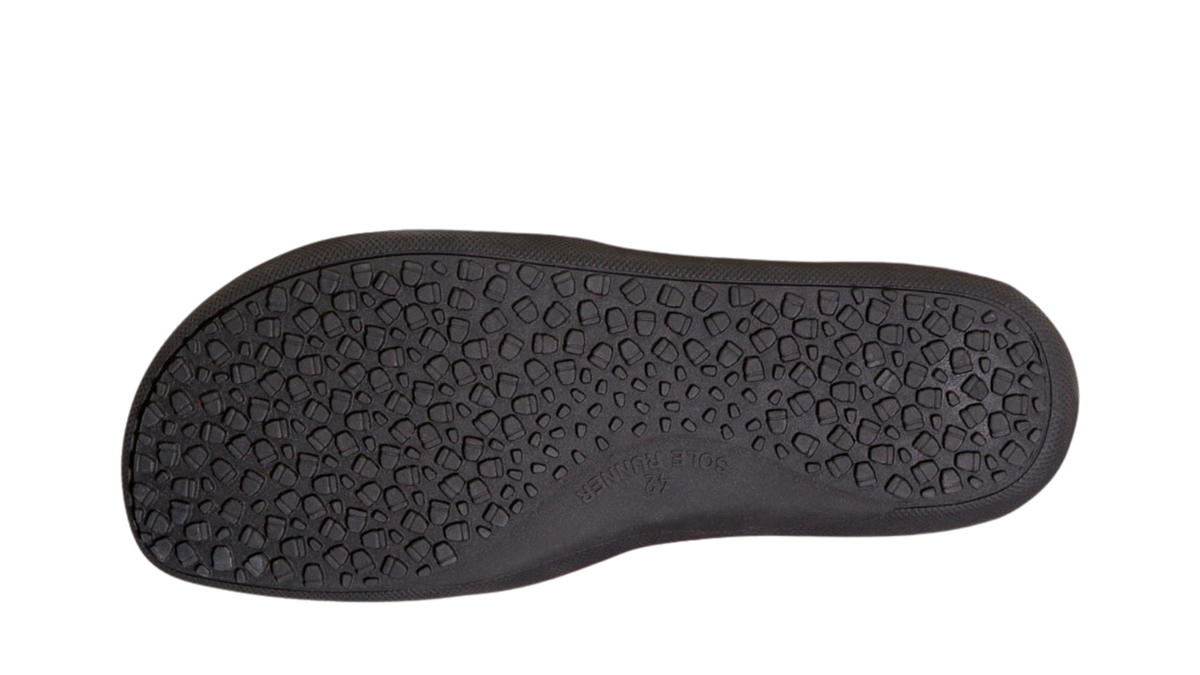 Kniehoher Barfußstiefel für Erwachsene mit profilierter, flacher Sohle, Ansicht von unten