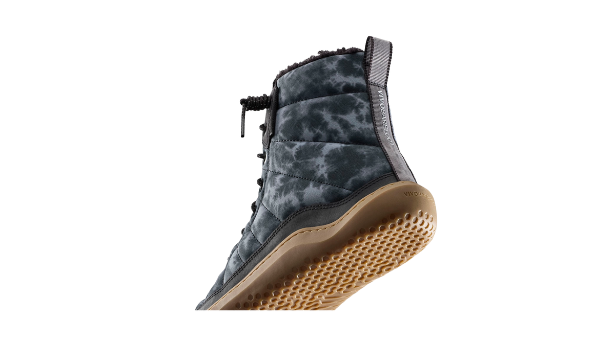 Barfußwinterstiefel, geschlossene Zehen und geschlossener Fersenbereich, Schnürung mit Ösen, profilierte Sohle, Detailansicht Fersenbereich