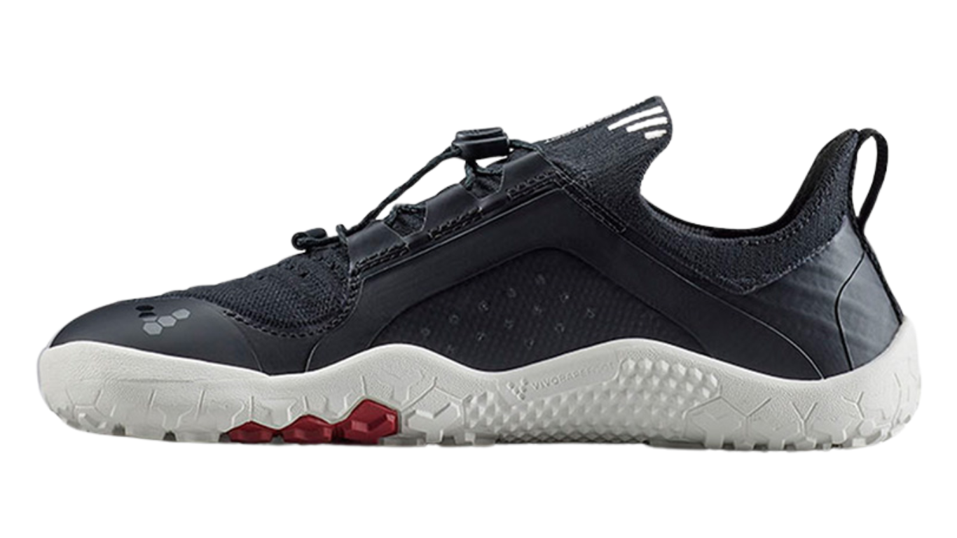 Barfußschuh mit Schnellverschluss, breite Zehenbox, flexible Sohle, geschlossener Fersenbereich, Seitenansicht innen, einzelner Schuh