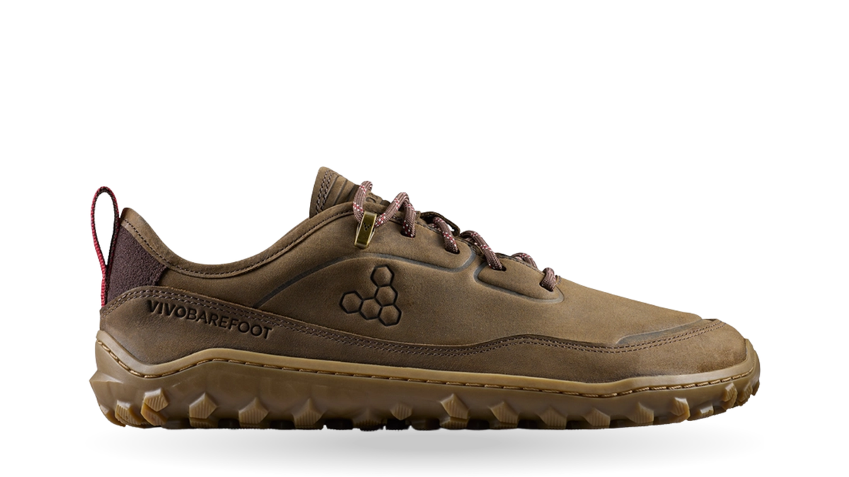 Barfußschuh, geschlossene Zehen und geschlossener Fersenbereich, Schnürung mit Ösen, profilierte Sohle, Seitenansicht außen, Einzelschuh