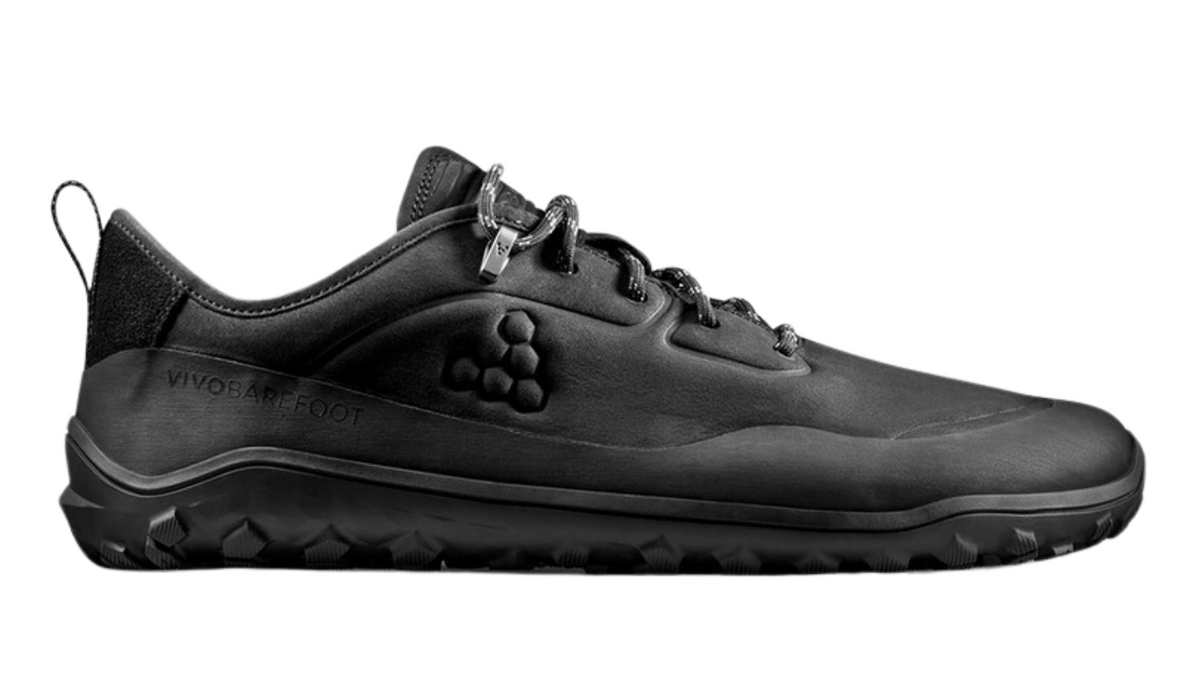 Barfußschuh, geschlossene Zehen und geschlossener Fersenbereich, Schnürung mit Ösen, profilierte Sohle, Einzelschuh, Seitenansicht außen