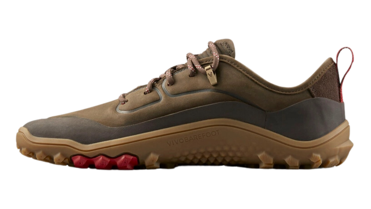 Barfußschuh, geschlossene Zehen und geschlossener Fersenbereich, Schnürung mit Ösen, profilierte Sohle, Seitenansicht innen, Einzelschuh