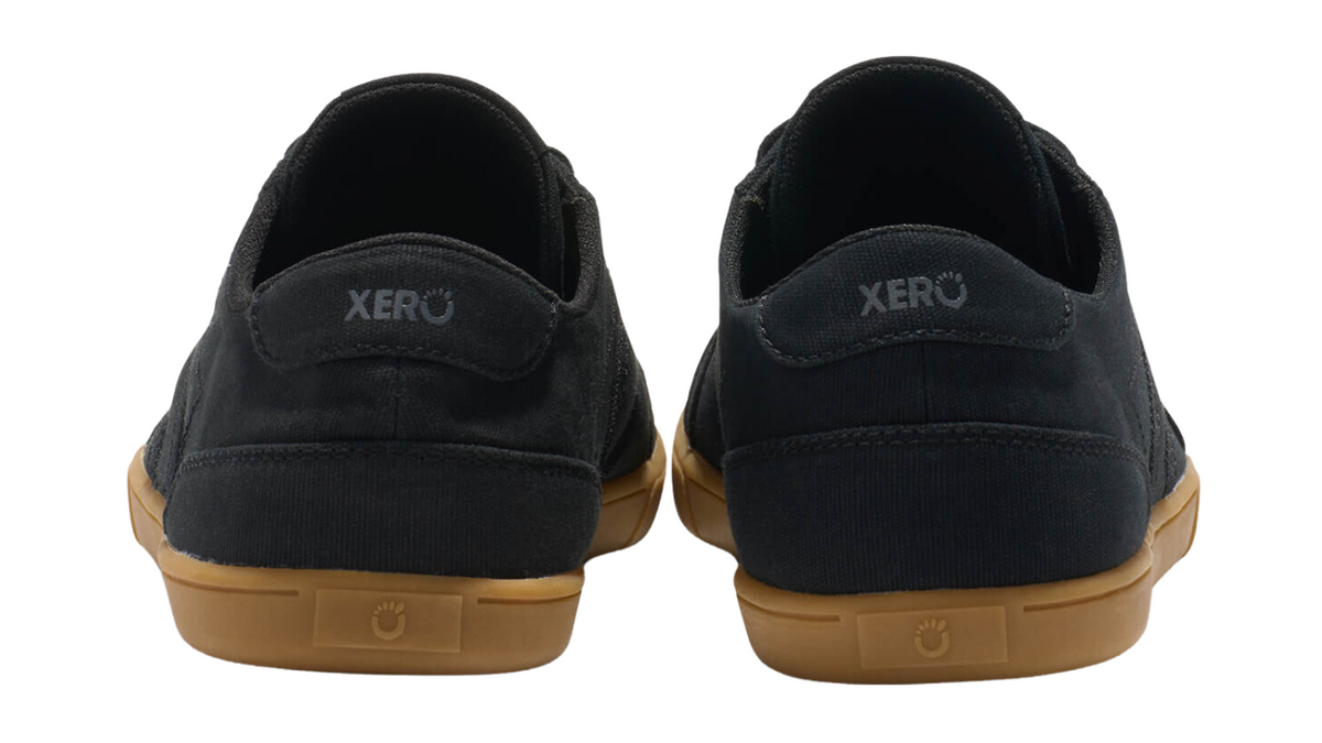 Barfußschuh mit Schnürung, breite Zehenbox, flexible Sohle, geschlossener Fersenbereich, Rückansicht als Paar
