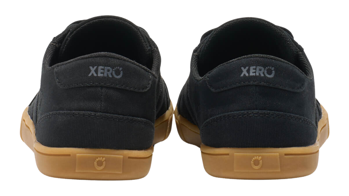 Barfußschuh mit Schnürung, breite Zehenbox, flexible Sohle, geschlossener Fersenbereich, Rückansicht als Paar