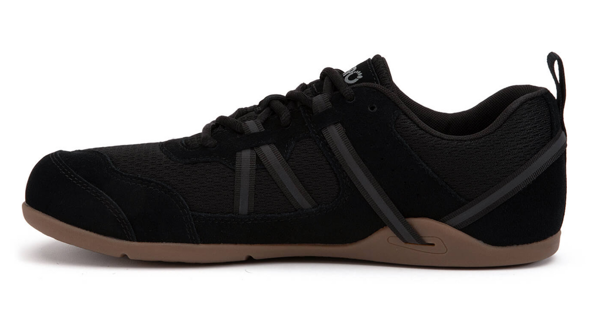 Barfußschuh mit Schnürung, breite Zehenbox, flexible Sohle, geschlossener Fersenbereich, Seitenansicht innen, einzelner Schuh
