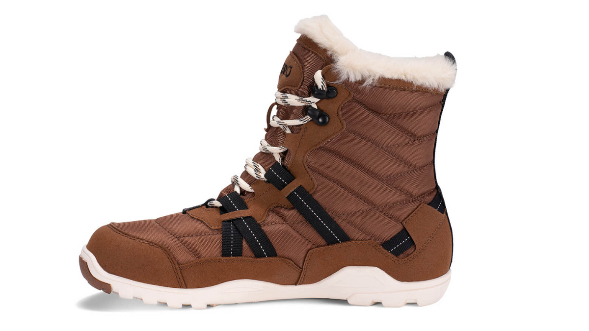 Barfußwinterstiefel, geschlossene Zehen und geschlossener Fersenbereich, Schnürung mit Ösen, profilierte Sohle, Einzelschuh, Seitenansicht innen