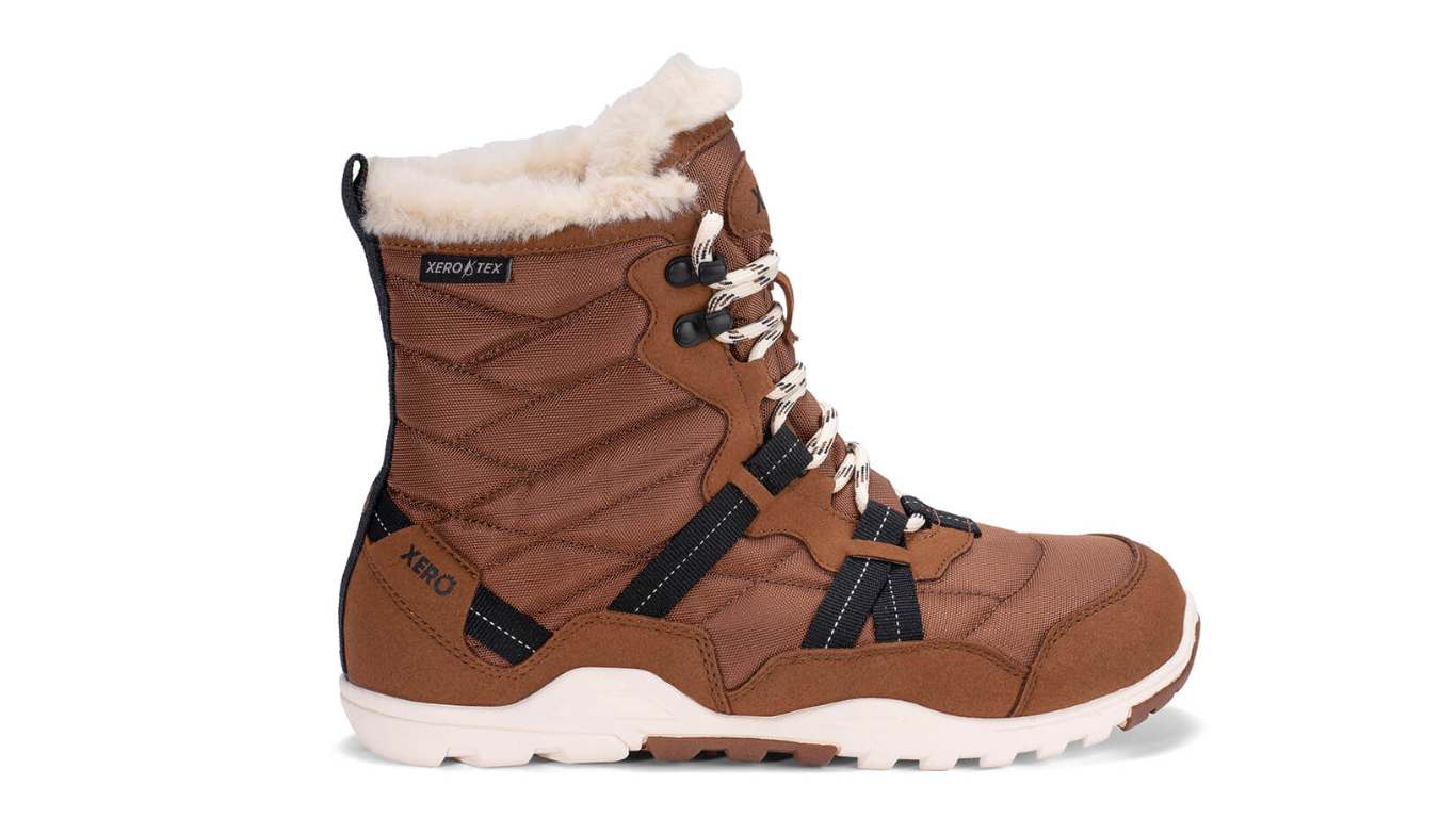 Barfußwinterstiefel, geschlossene Zehen und geschlossener Fersenbereich, Schnürung mit Ösen, profilierte Sohle, Einzelschuh, Seitenansicht außen