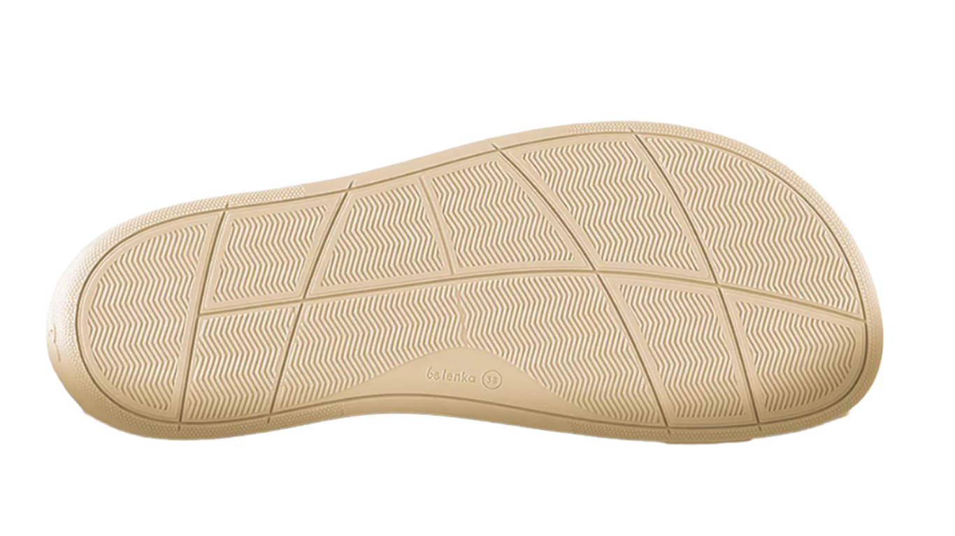 Barfußschuh, Ansicht von unten. Einzelansicht der flachen Sohle mit strukturierter Oberfläche.