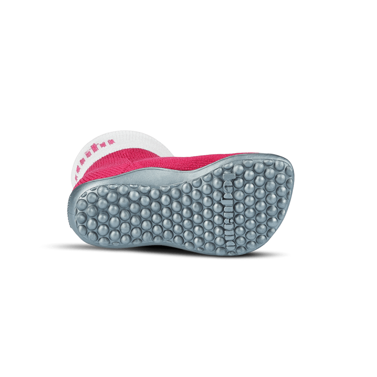 Barfußschuh mit geschlossener Zehenbox und geschlossenem Fersenbereich, elastischer Schaft ohne Verschluss, flexible Sohle mit runden Profilnoppen, Ansicht von unten