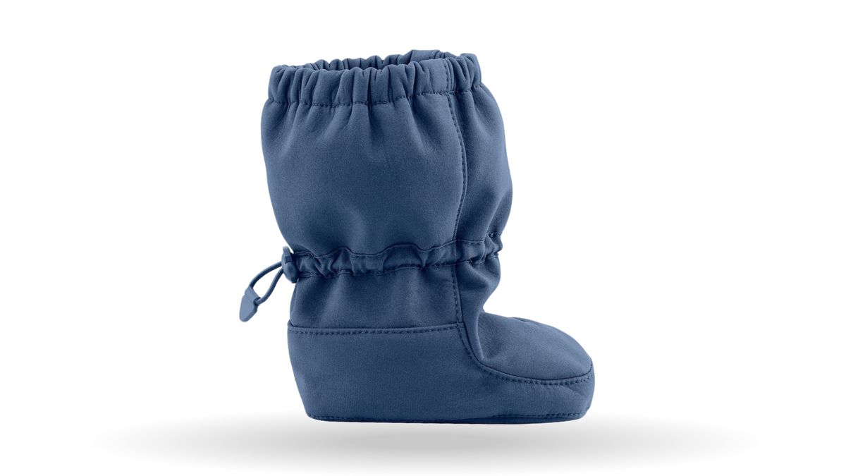 Barfußstiefel für Kinder, geschlossene Zehenpartie, geschlossener Fersenbereich, hoher Schaft mit Gummizug und Stopper, flache Sohle, Seitenansicht außen